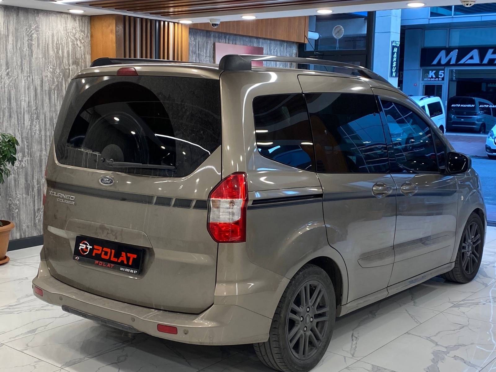 Ford Tourneo Courier серый